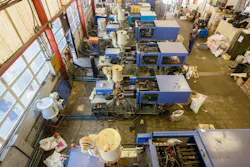 An injection molding shop floor. An injection molding shop floor.