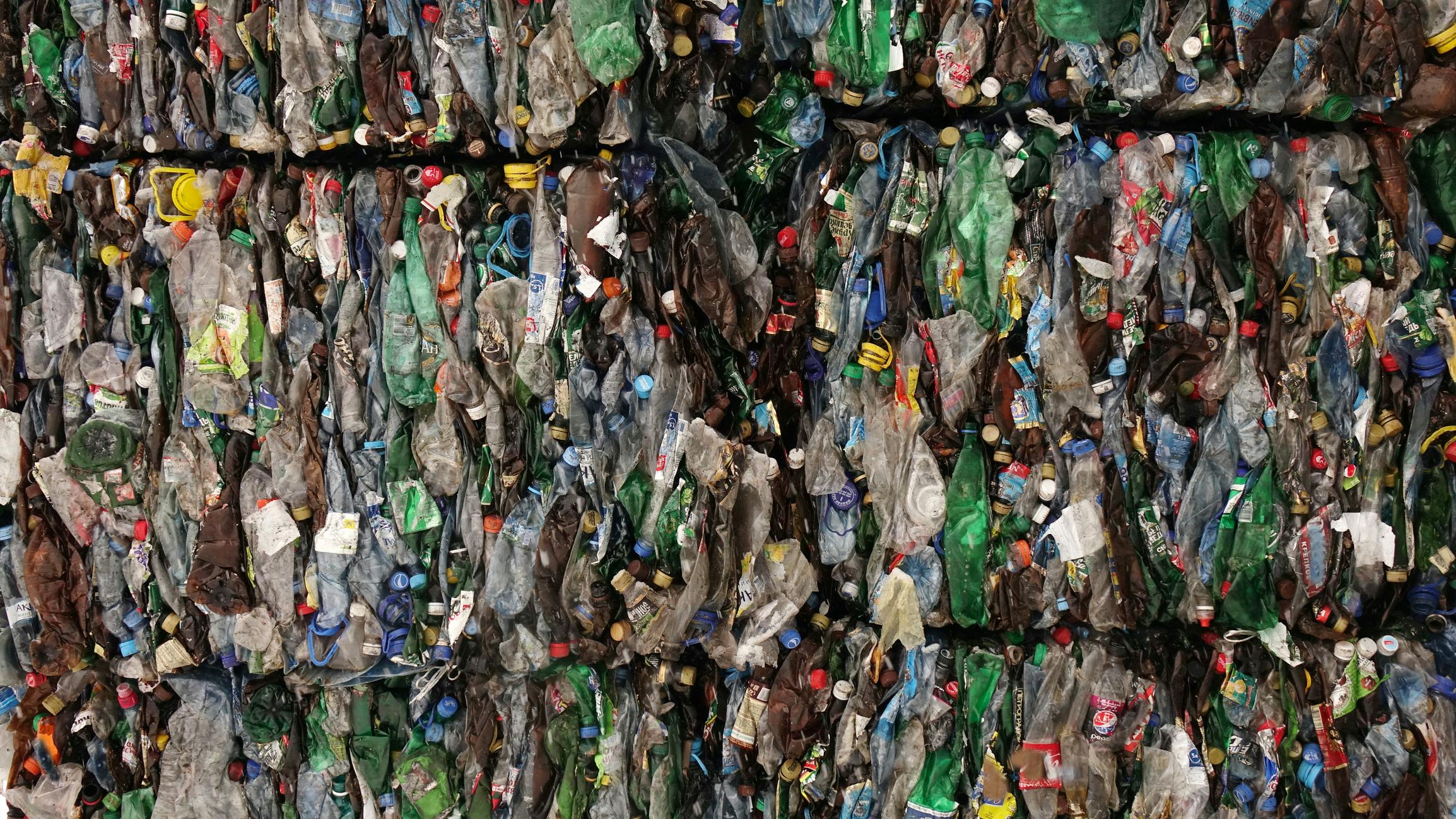 Bales of plastic waste await recycling.
