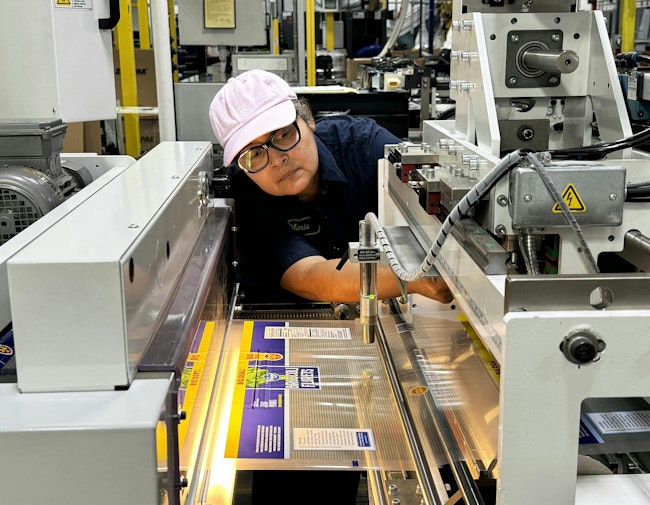 A worker at Emerald Packaging. The company has been striving to make its plastic packaging more sustainable.