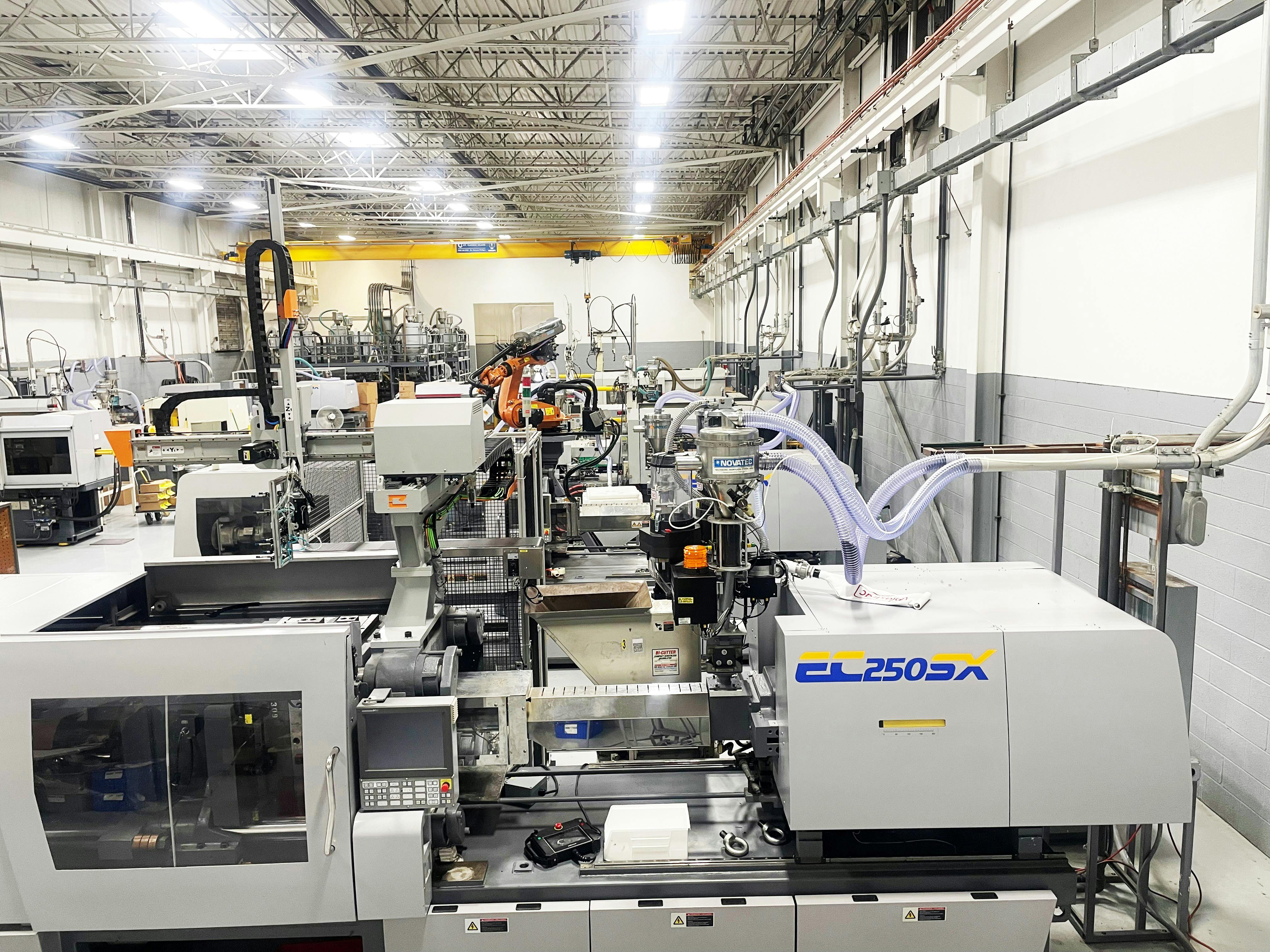 Champion Plastics operates 11 injection molding machines and is highly automated with some of its lines running lights-out.