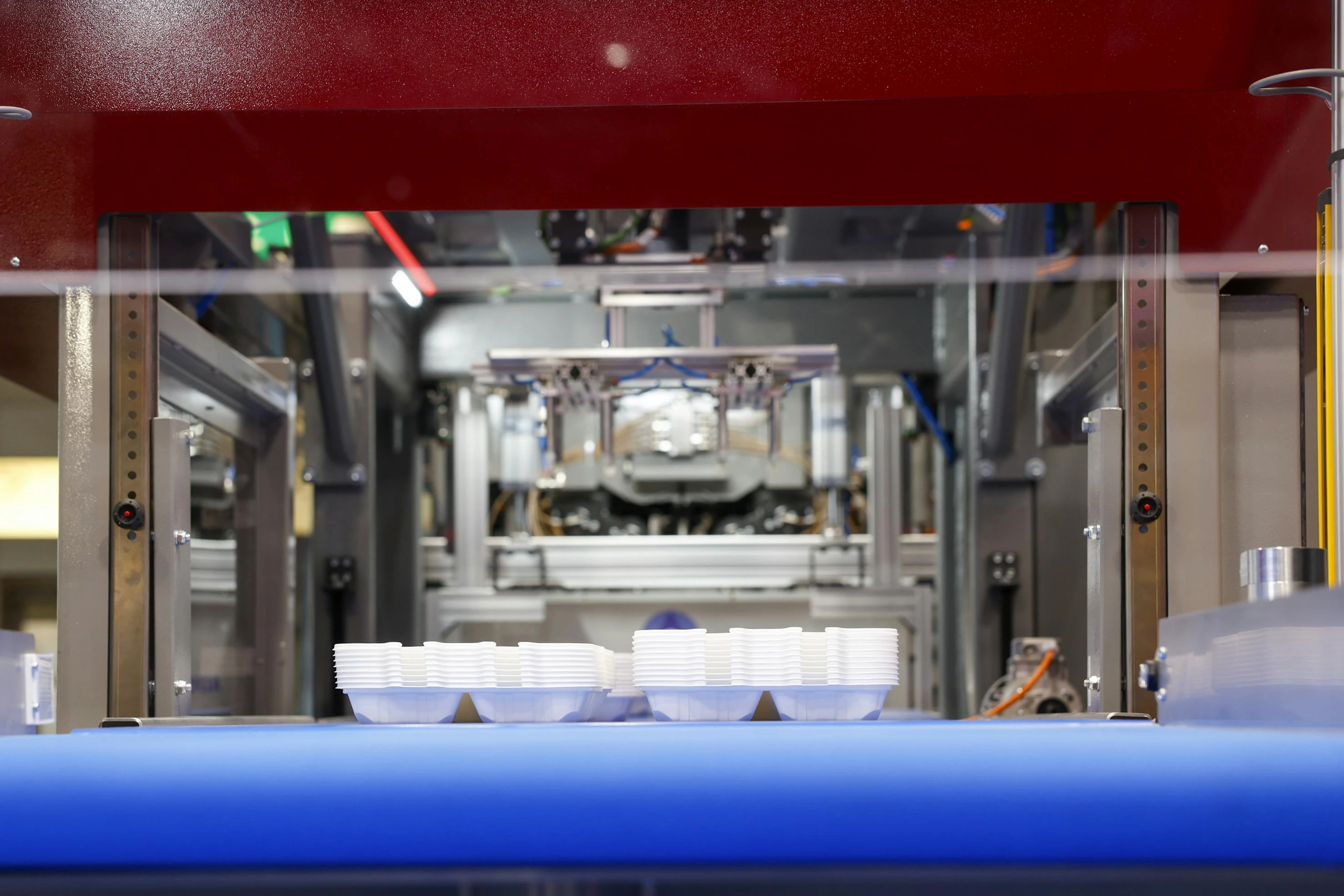 Trays on a demonstration line at K 2025.