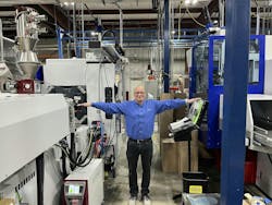 Manufacturing engineer Phil Dunn demonstrates the narrowness of the aisles at ITW Deltar Fasteners. Manufacturing engineer Phil Dunn demonstrates the narrowness of the aisles at ITW Deltar Fasteners.