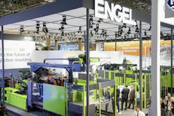 K 2025 attendees check out the Engel booth. K 2025 attendees check out the Engel booth.