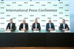 Five Arburg executives at a table for a press conference at Technology Days. Five Arburg executives at a table for a press conference at Technology Days.