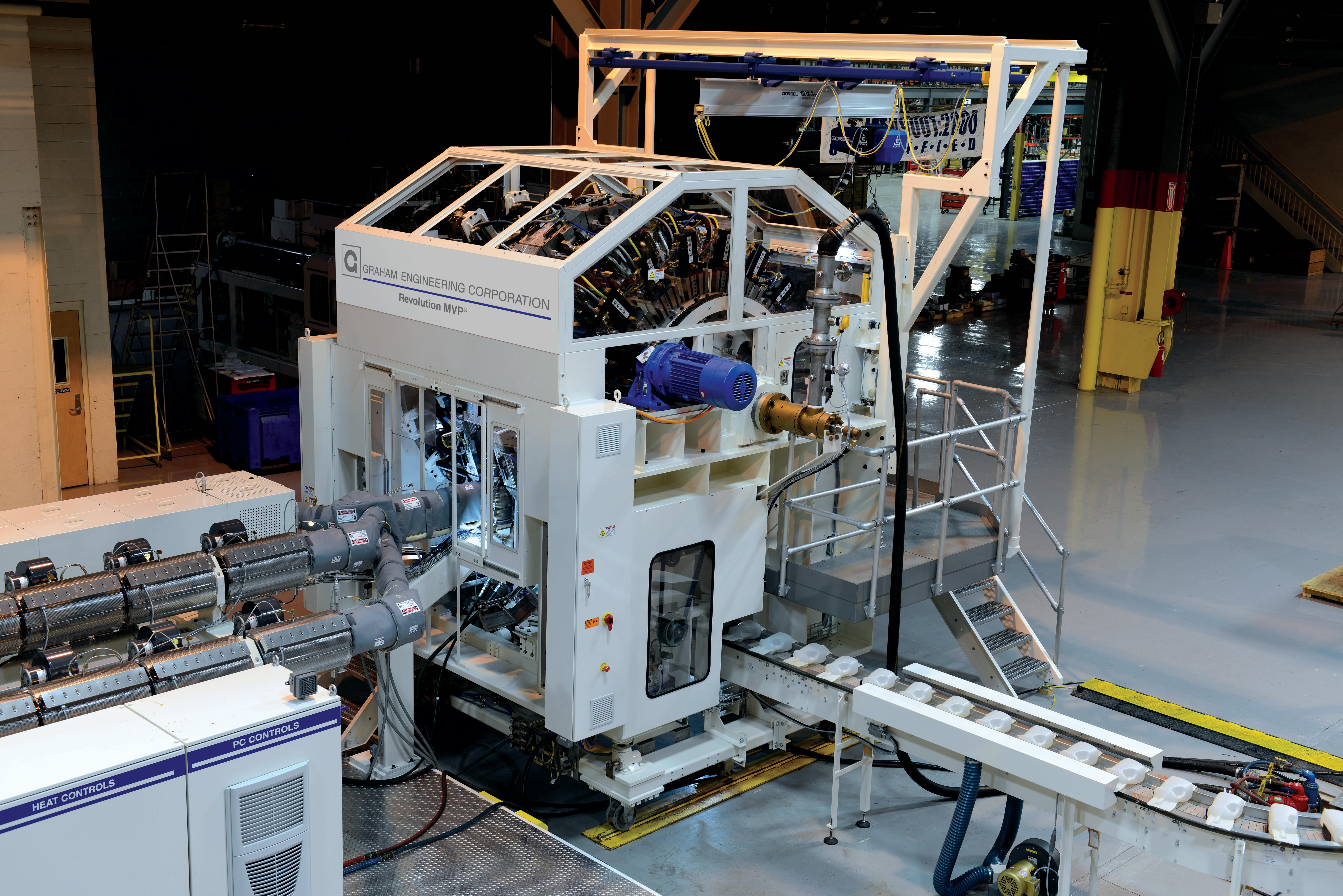 The Revolution MVP is configurable with 12 to 24 stations and up to 10 extruders in dual-parison setups.