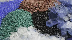 Recycled plastic pellets in various colors.