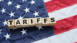 An American flag overlaid with the word 'tariffs.'