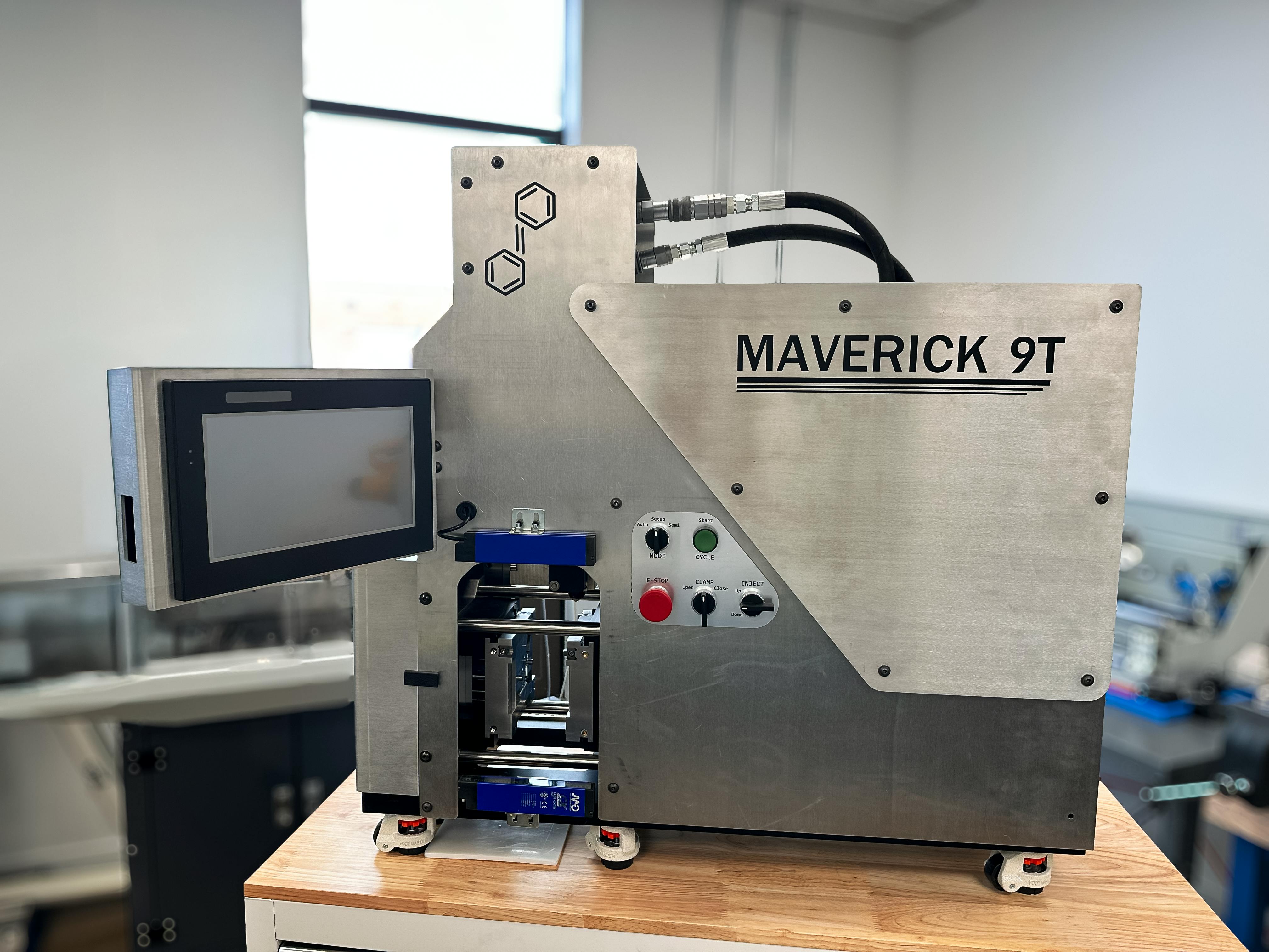 The Maverick 9T is a benchtop injection molding machine with 9 tons of clamping force.