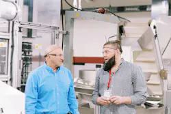 Two workers in the tool room at Hoffer Plastics. Two workers in the tool room at Hoffer Plastics.