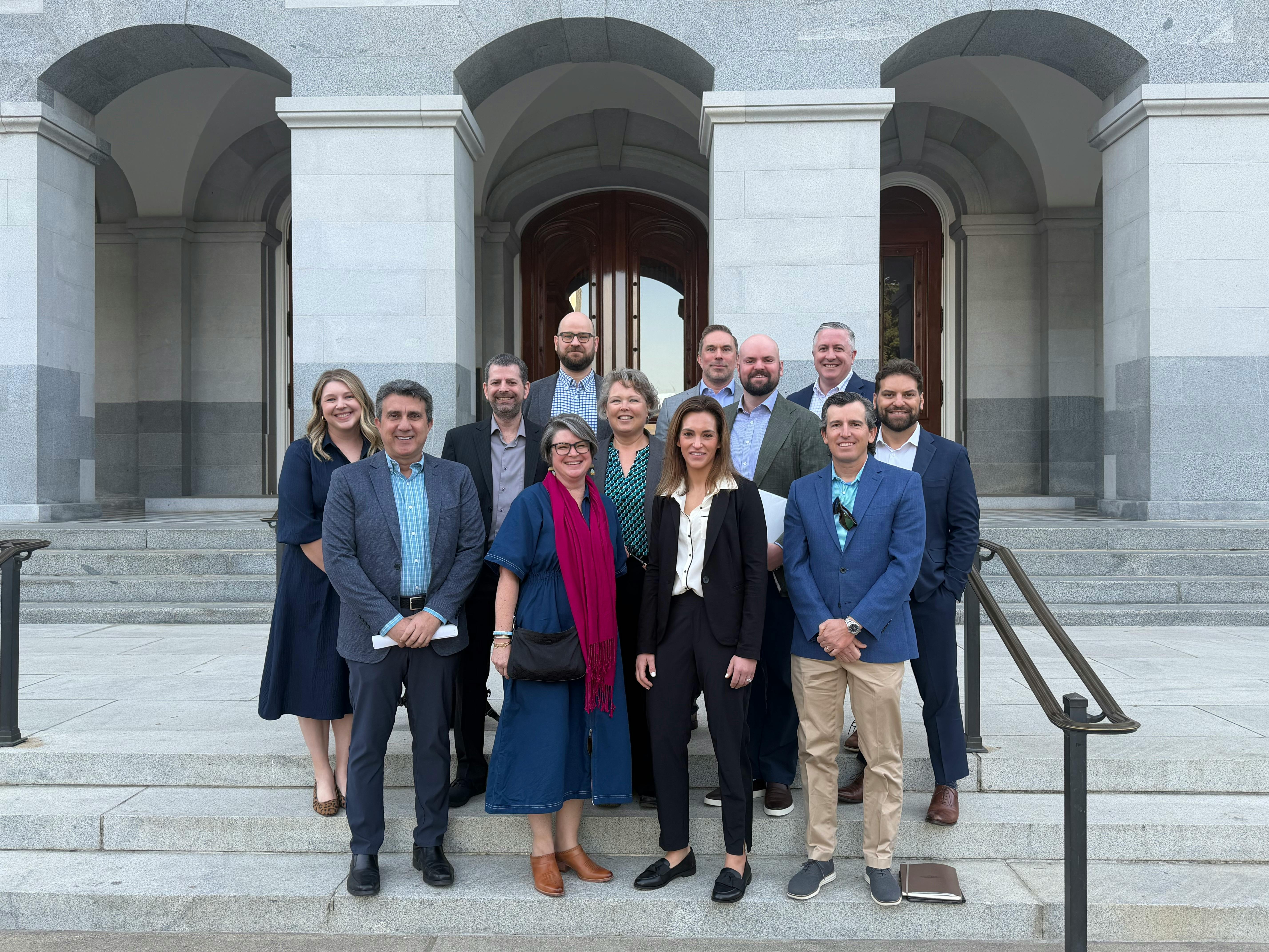 Fly-In participants stand on the steps of the California State Capitol.