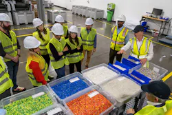 Tomra recycling testing facility with bins of materials Tomra recycling testing facility with bins of materials