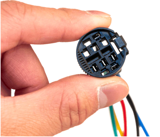 This momentary switch connector was printed in bulk using the Figure 4 3D printer and Figure 4 Tough FR V0 material.