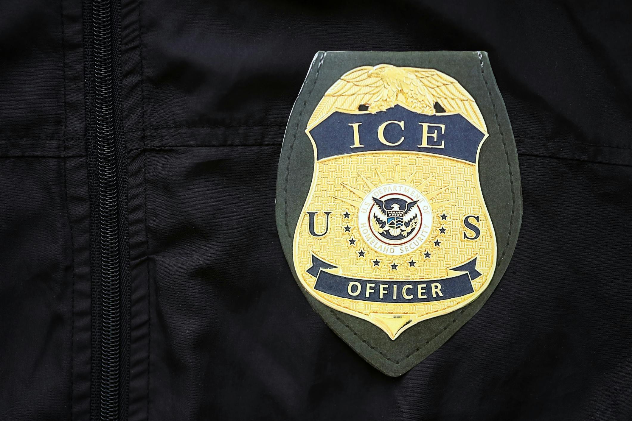An Immigration and Customs Enforcement (ICE) badge.