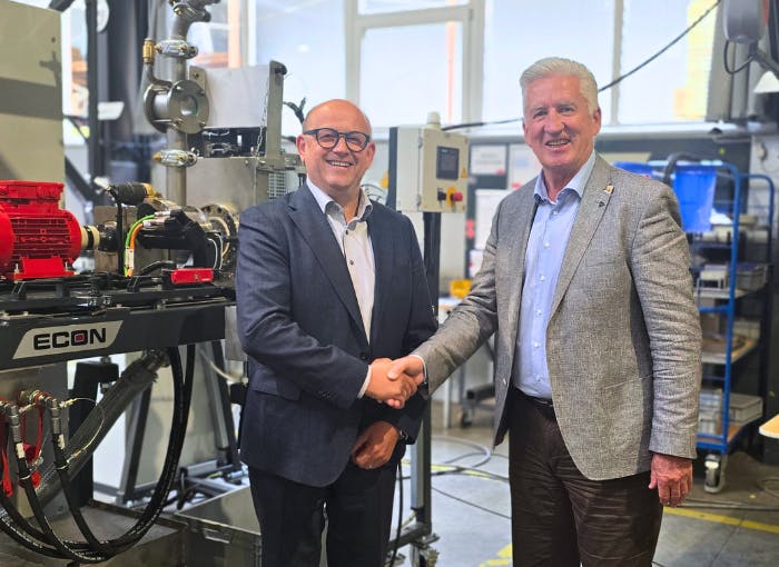 Gerhard Hehenberger, founder and CEO of Econ GmbH (right), congratulates Friedrich Rechberger, the company's new managing director.