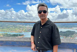 Mahesh Gupta stands atop of Rock of Guatapé in Columbia.