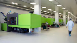 Injection molding machines for medical manufacturing in a clean room.