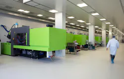 Injection molding machines for medical manufacturing in a clean room.