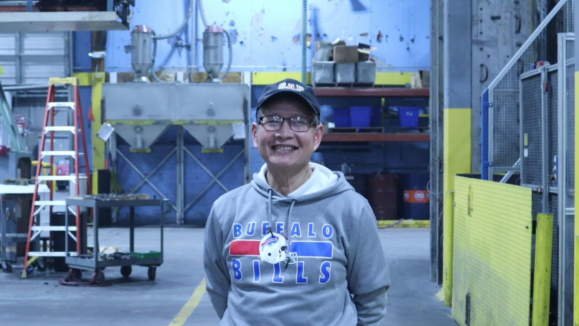 Immigrants comprise about one-quarter of Confer Plastics' workforce. They hail from countries around the world, including Vietnam, Myanmar, Sudan, Iran, Jamaica, Thailand, South Korea and Bosnia. Pictured is employee Hoa Bui, who was born in Vietnam.