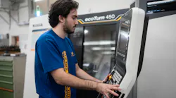 A worker operates a machine at fhw-moulds GmbH in Bottrop, Germany.