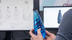 Hands hold a blue bottle in front of a screen showing simulations of the bottle design.