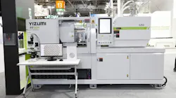 Yizumi's FF30M injection molding machine debuted at K 2025, producing microfluidic chips.