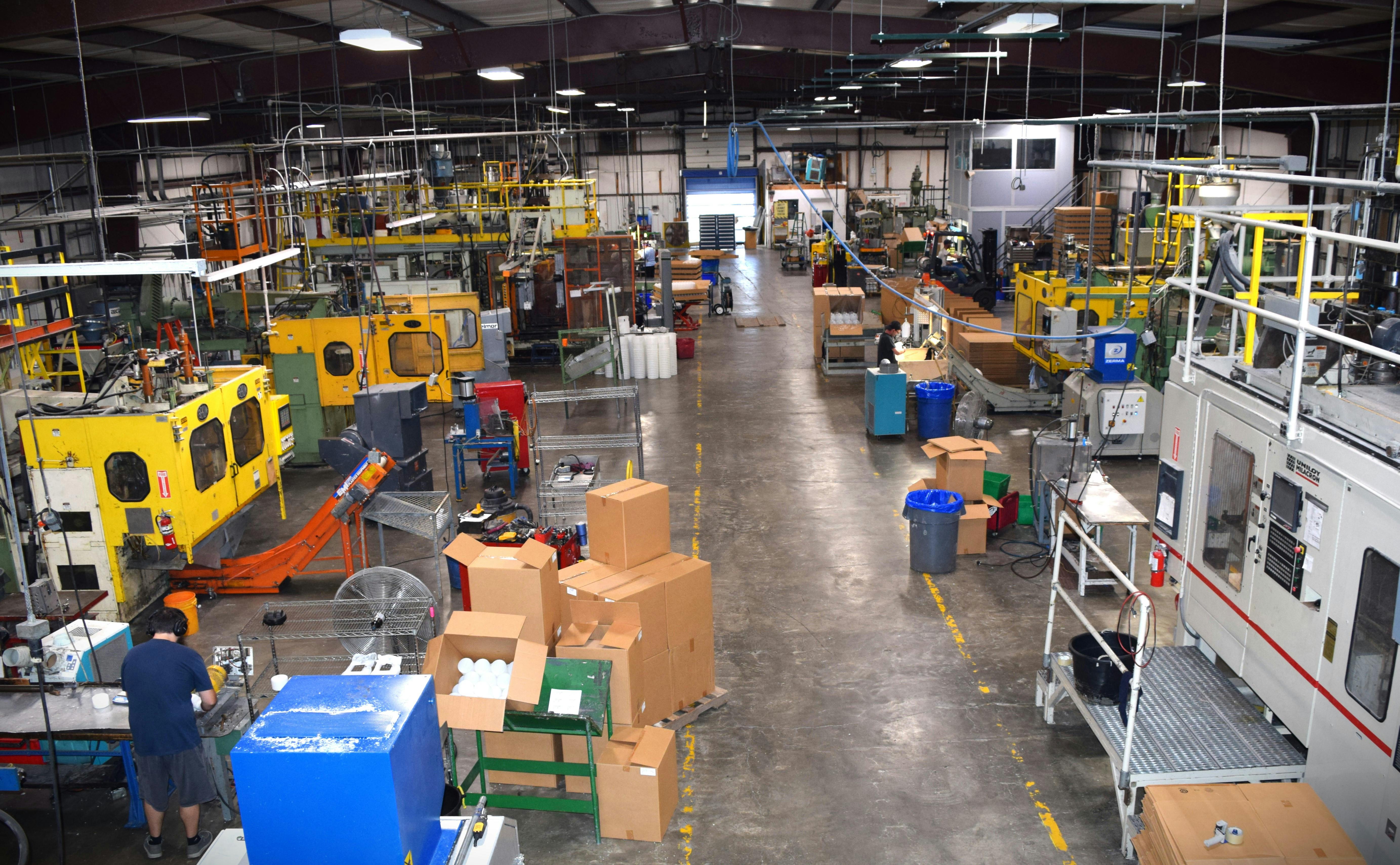 Factory floor of Plastics Packaging Concepts, a custom blow molder in Garden City, Mo.