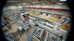 This 4,500-ton KraussMaffei ColorForm injection molding machine makes PUR-coated automotive parts at Omega Tool Corp.