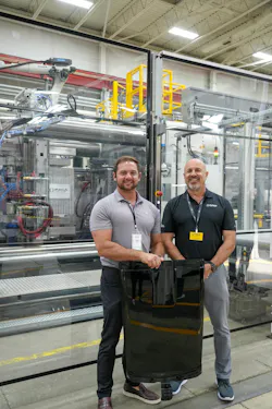 John Fini (left), president of KraussMaffei Corp., and Dave Cecchin, president of Omega Tool Corp., showed off the capabilities of ColorForm technology at Omega's June open house.
