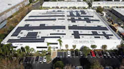 View of the large roof and solar energy system at Orange County Industrial Plastics.
