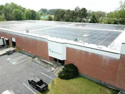 C&K Plastics plant exterior photo showing solar array.
