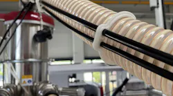 These EcoFritz clamps, produced in a circular Wittmann molding cell, replace single-use zip ties in connecting cables to corrugated hoses.
