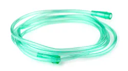 Green medical tubing against a white background