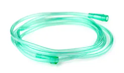 Green medical tubing against a white background