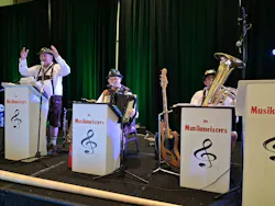 The Musikmeisters play for the ABC crowd at the Oktoberfest party.