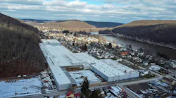 Aerial view of the facility at 325 Buffalo Street in Franklin, Pennsylvania, where Conair has leased 157,760 square feet to expand fabrication, machining, and powder coating capabilities.