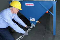 Quick-disconnect clamps near the drive point and a removable cleanout cap at the opposite end of the conveyor (shown) allow for easy removal and cleanout of the flexible screw during material changeovers.